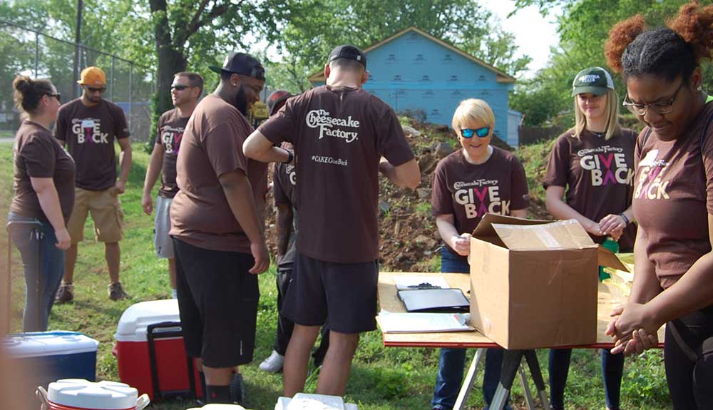 The Cheesecake Factory team members participating in a volunteer program